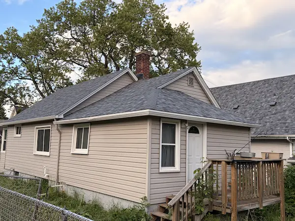 Completed asphalt shingle roof replacement on a residential home