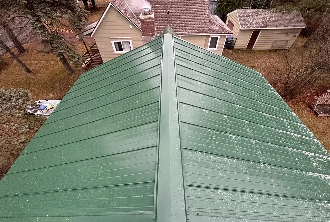 roof replacement project on a home in a wooded area
